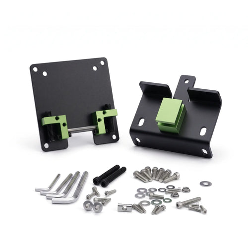 Disassembled VESA monitor mount bracket with black plates and green components, accompanied by a hardware kit including various screws, washers, and Allen wrenches on a white background.
